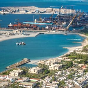 DUBAI, UAE - DECEMBER 10, 2016: Helicopter viewpoint on Dubai beach and port.